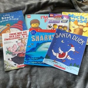 Bundle of 7 books. 2 Lego books, sharks book, other Scholastic. Like new.
